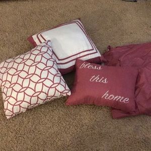 Three pillows and a bed skirt for a queen size bed